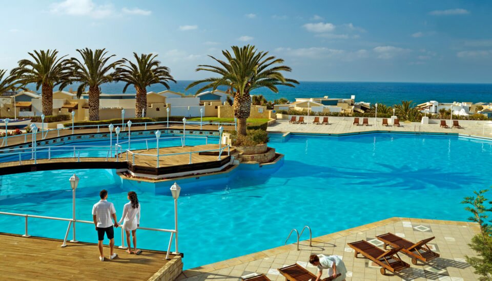 Pool Area Knossos Royal 5-star Knossos Royal Beach Resort in Crete | Book Hotel rooms online
